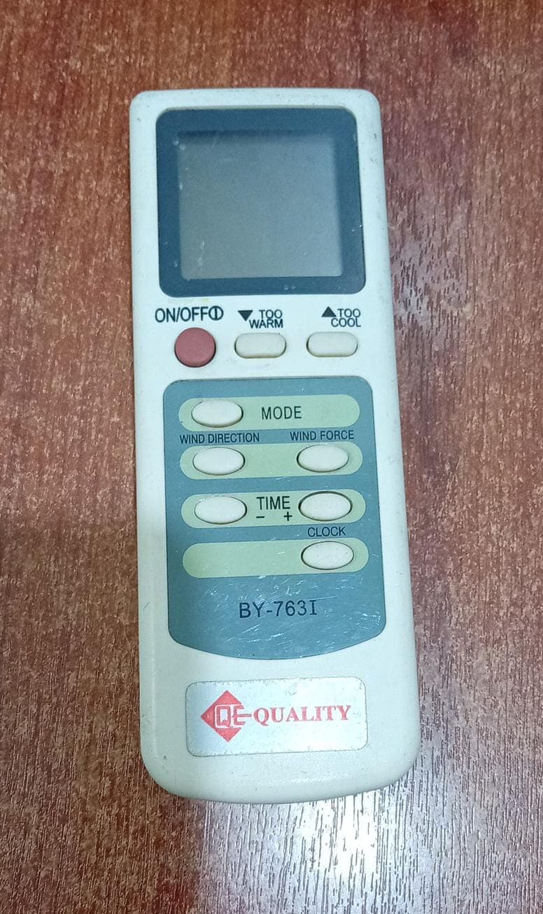 Control remoto aire acondicionado GENÉRICO BY‑7631 (usado, sin tapa baterías) — imagen 1