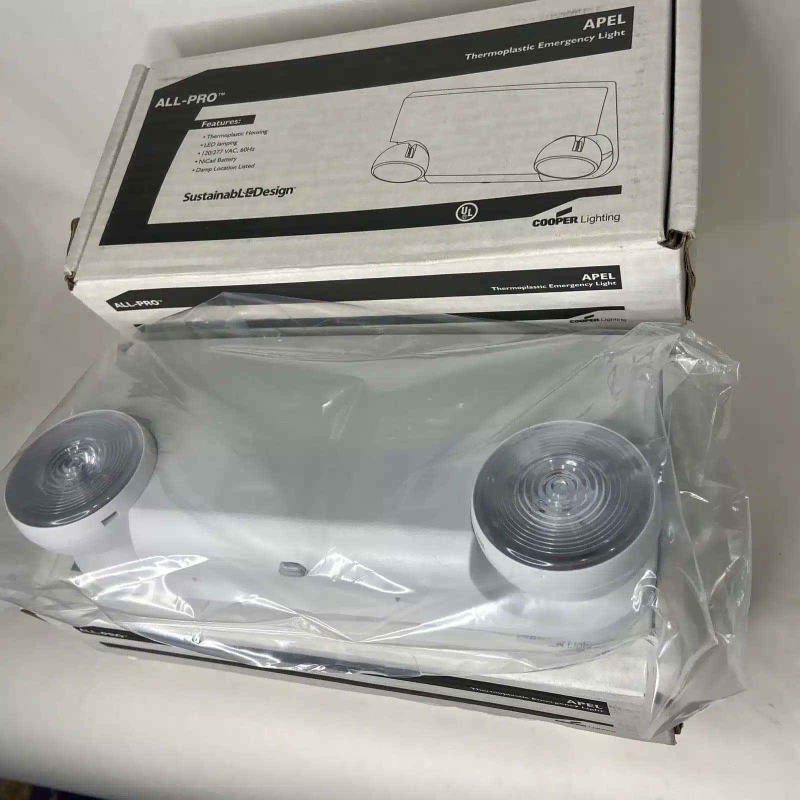 EATON | LÁMPARA LED DE EMERGENCIA, 2 CABEZALES, APEL COOPER LIGHTING — imagen 1