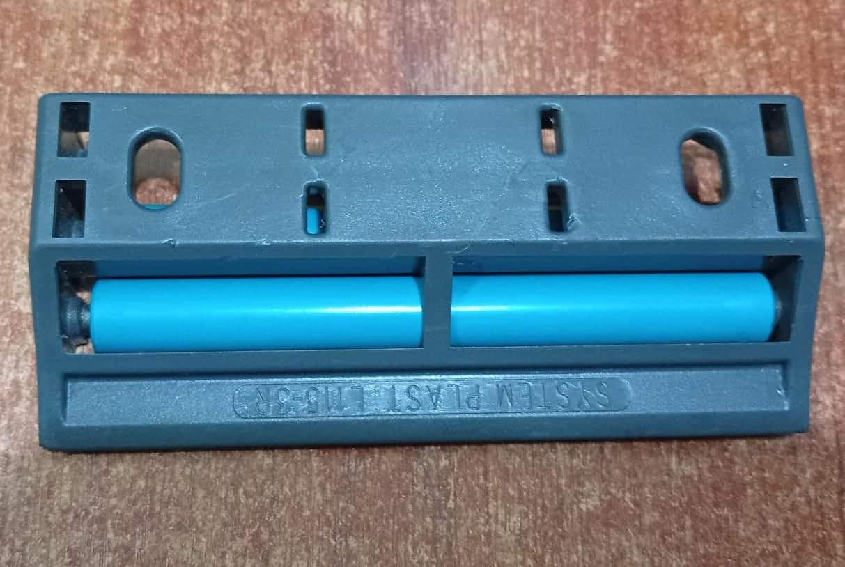 Placa de transferencia con rodillos System Plast L115‑3R (usada con daño lateral) — imagen 1